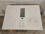30IN G.e. Profile Downdraft PP9830TJ1WW White Tested With Signs Ware. Fixed Price $876.99.