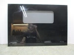 Range Door 29 3/8 X 20 5/8 Part # WB56T10035. Fixed Price $130.00.