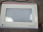 Oem Ge Microwave White Door Assembly WB56X10582 JE1860WH04 Complete. Fixed Price $74.99.