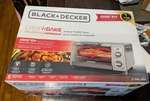 Black+decker 4-SLICE Crisp 'n Bake Air Fry Toaster Oven Stainless Steel TO1787SS. Fixed Price $40.00.