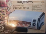 Brand New Presto Stainless Steel Pizza Oven. Fixed Price $50.00.