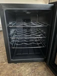 Magic Chef Wine Cooler Bottle MCWC12B Reflective Door. Fixed Price $150.00.