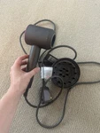 Dyson Supersonic Hair Dryer, Iron/fuchsia. Fixed Price $160.00.