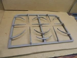 Maytag Range Burner Grate (taupe) - Lt. Stains Part # 74009121. Fixed Price $79.98.