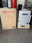 New In Box Noritz Tankless Water Heater NR501-OD-NG Silver Edition. Fixed Price $549.00.