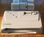 Foodsaver Vacuum Sealer V825 Store Cut Canister Fresh W/saver Rolls. Fixed Price $42.80.
