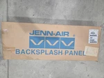 Jenn-air Pro-style Cooktop Backsplash Stainless Steel JXT9027AAP. Fixed Price $399.99.