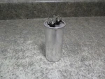 Ge Air Conditioner Running Capacitor Part # WJ20X10008. Fixed Price $75.00.