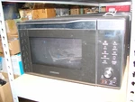 Samsung MC11K7035CG Black Stainless Steel Convection Microwave Oven 1.1 Cu.ft.. Fixed Price $189.98.