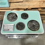 Vintage General Electric Push Button Turquoise Stove Top. Fixed Price $450.00.
