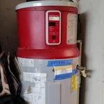 Geospring Pump Electric Water Heater Red Gray High Demand Storage Tank. Fixed Price $750.00.