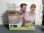 New Food Dehydrator, Nutrichef Kitchen Electric Countertop Preserver PKFD12. Fixed Price $49.95.