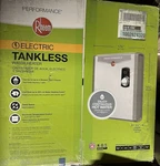 $549 Rheem RETEX-27 , Electric Tankless Water Heater **missing Knob 240V. Fixed Price $195.00.